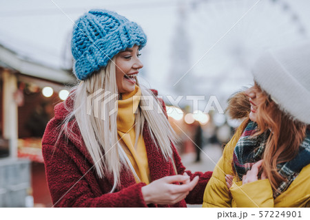 Positive delighted blonde female laughing at joke 57224901