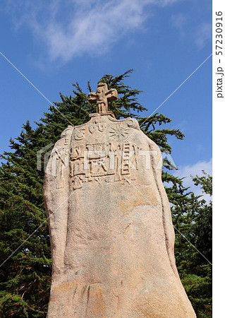 Christianized menhir of Saint-Uzec in Brittany Christianized menhir of Saint-Uzec in Brittany 57230916