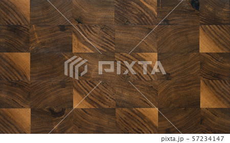 Texture of walnut end grain cutting board with oil finish Texture of walnut end grain cutting board with oil finish 57234147