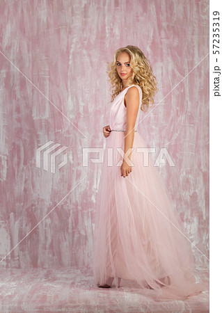 beautiful curly blonde bride pink dress 57235319
