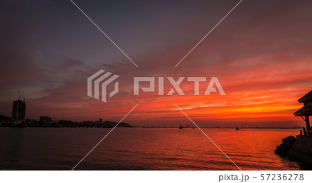 cloudy orange and sea tropical sunset 57236278