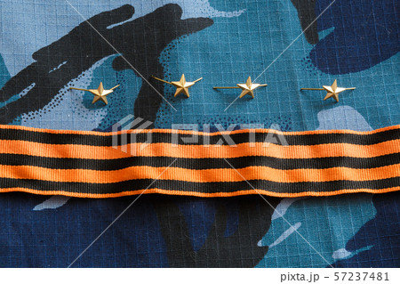 Gold stars, St. George ribbon on blue camouflage Gold stars, St. George ribbon on blue camouflage 57237481