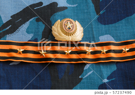 Gold stars, St. George ribbon on blue camouflage Gold stars, St. George ribbon on blue camouflage 57237490