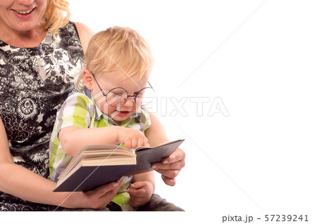 Cute happy kid reading a book 57239241