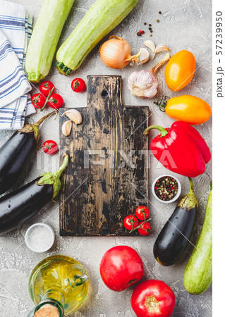 Cutting board, vegetables and herbs Stock Photo by ©VadimVasenin 163603944