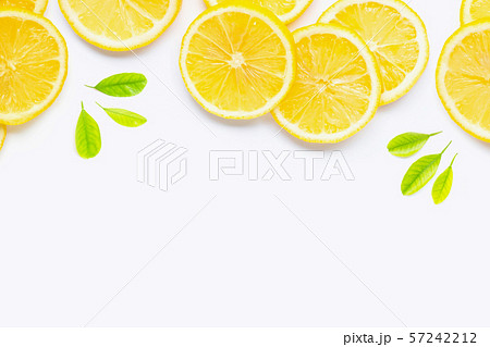 Frame made of fresh lemon with slices on white Frame made of fresh lemon with slices on white 57242212