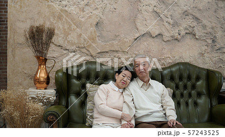 Rich Asian senior parents sit in luxury beautiful 57243525