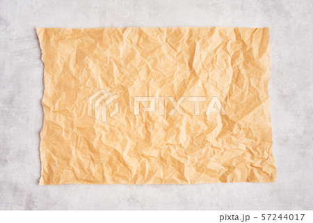 Crumpled piece of brown parchment or baking paper Crumpled piece of brown parchment or baking paper 57244017
