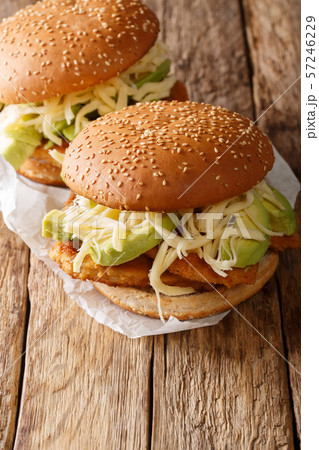Spicy Chipotle Chicken Cemita Sandwich close-up. Spicy Chipotle Chicken Cemita Sandwich close-up. 57246229