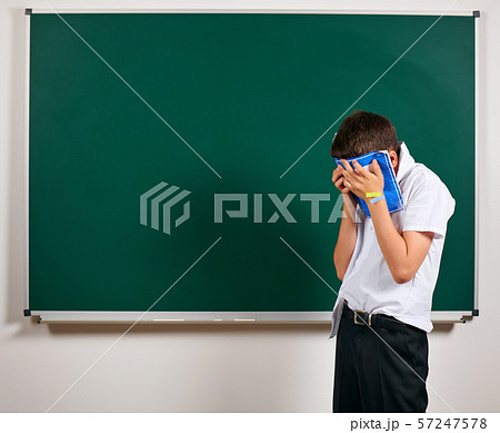 Portrait of funny pupil. School boy very 57247578