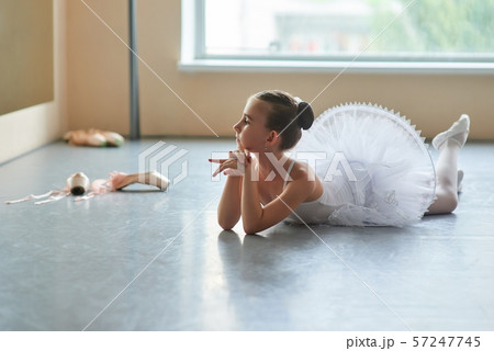 Lovely young ballerina posing in studio. 57247745