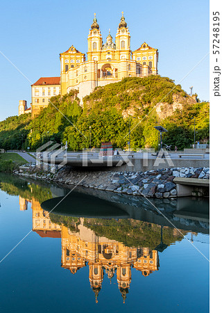 Melk Abbey, German: Stift Melk, reflected in the water of Danube River, Wachau Valley, Austria Melk Abbey, German: Stift Melk, reflected in the water of Danube River, Wachau Valley, Austria 57248195