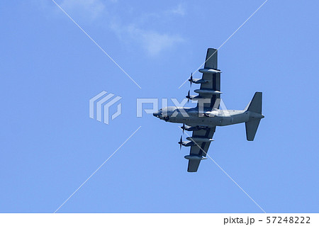 grey military transport plane fly on blue sky grey military transport plane fly on blue sky 57248222