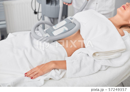 relaxed calm woman taking treatment in the clinic 57249357