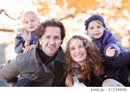 Family hug in autumn park 57249690