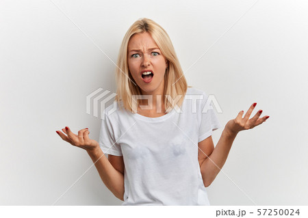 agressive girl having argument with a friend 57250024