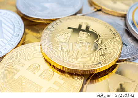 Bunch of Crypto currency coins with focus on BTC Bitcoin 57250442