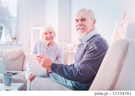 Beaming pensioners feeling happy while spending weekend together 57258761