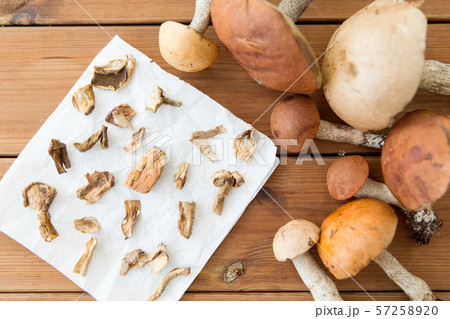 dried mushrooms on baking paper 57258920
