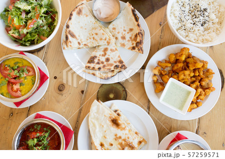 various food on table of indian restaurant 57259571