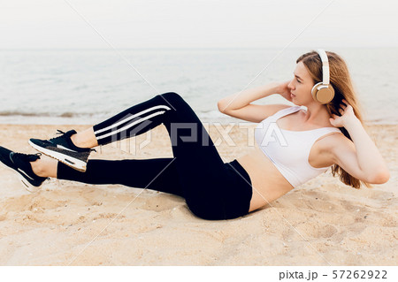 sporty girl doing exercises on the belly press, sporty girl doing exercises on the belly press, 57262922