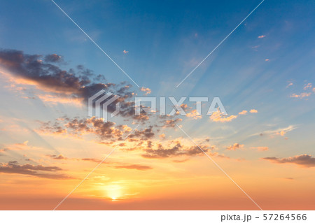 Sunrise sundown sky with  soft clouds and sunbeams 57264566