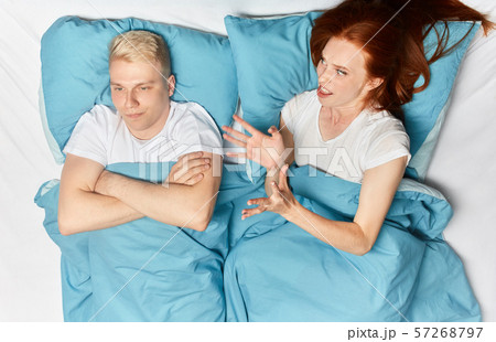 angry irritated woman scolding her husband angry irritated woman scolding her husband 57268797