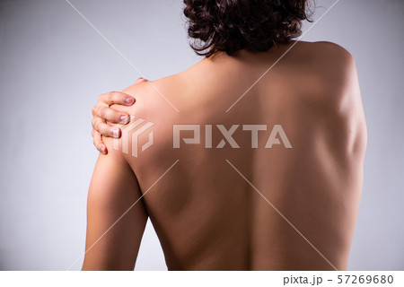 Young man suffering from upper limb pain Young man suffering from upper limb pain 57269680