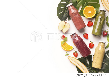 Healthy detox vitamin diet smoothie with fruits on white Healthy detox vitamin diet smoothie with fruits on white 57271127