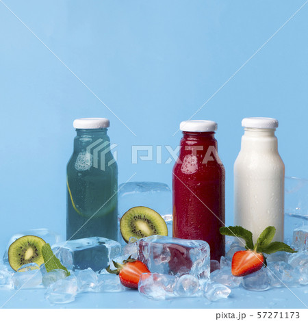 Detox fruit infused flavoured detox cocktails on blue background Detox fruit infused flavoured detox cocktails on blue background 57271173