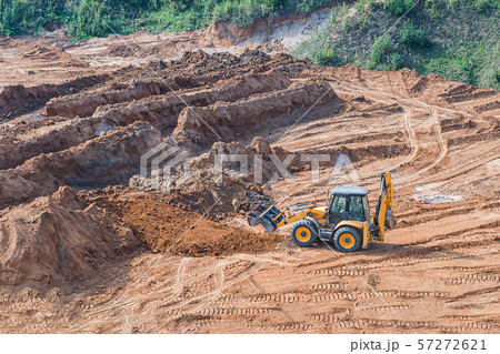 Wheel loader excavator machine working in construction site. wheel loader at sandpit during 57272621