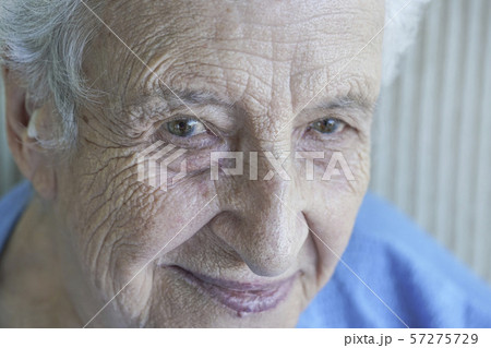 Closeup face of a lovely senior woman Closeup face of a lovely senior woman 57275729