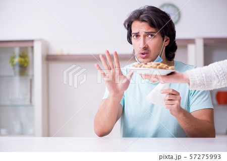 Young man suffering from allergy 57275993