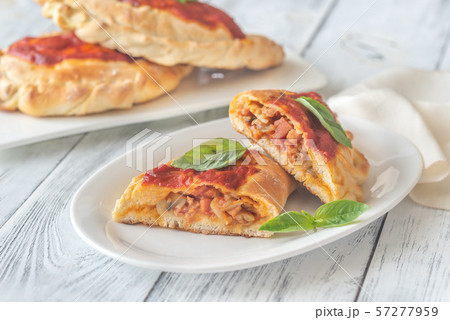 Homemade calzone on the plate 57277959