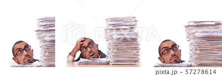 Busy businessman with lots of papers Busy businessman with lots of papers 57278614