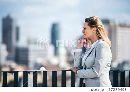A portrait of young businesswoman standing outdoors. Copy space. 57279493