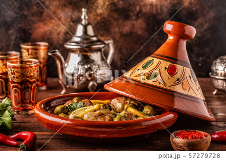 Traditional Moroccan chicken tagine with olives Traditional Moroccan chicken tagine with olives 57279728