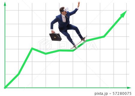 Businessman riding skateboard on financial graph 57280075