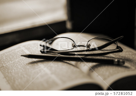 Old books that were left on the window in a quiet Old books that were left on the window in a quiet 57281052