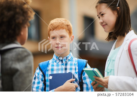 School children studying at school 57283104