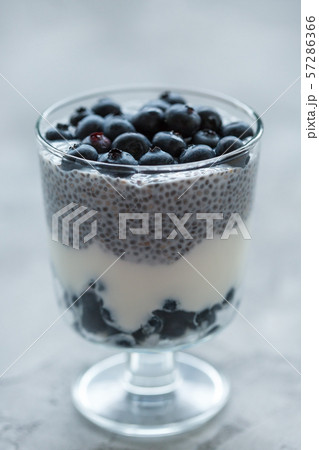 Chia pudding with almond milk, yogurt, blueberries 57286366