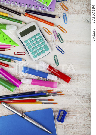 Items for the school on a wooden table. Items for the school on a wooden table. 57303194