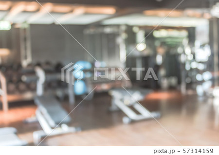Blur gym background fitness center or health club with blurry sports exercise equipment for aerobic workout and bodybuilding 57314159