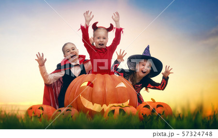 kids in Halloween carnival costumes 57324748