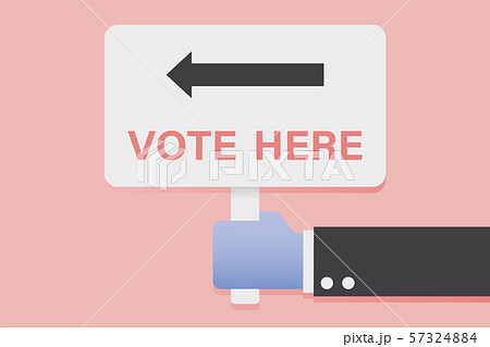 Hand Holding Vote Here Sign. 57324884