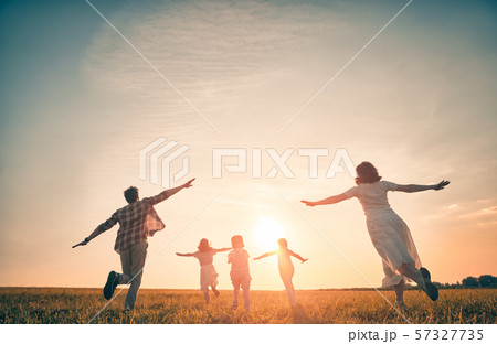 Happy family on autumn walk Happy family on autumn walk 57327735