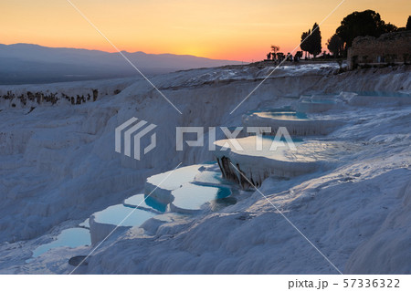 Carbonate travertines the natural pools during sunset, Pamukkale, Turkey	 57336322