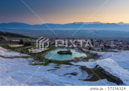 Carbonate travertines the natural pools during sunset, Pamukkale, Turkey Carbonate travertines the natural pools during sunset, Pamukkale, Turkey 57336324