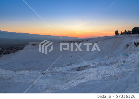 Carbonate travertines the natural pools during sunset, Pamukkale, Turkey 57336326