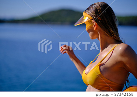 Bikini girl on the beach. Young beautiful woman in Bikini girl on the beach. Young beautiful woman in 57342159